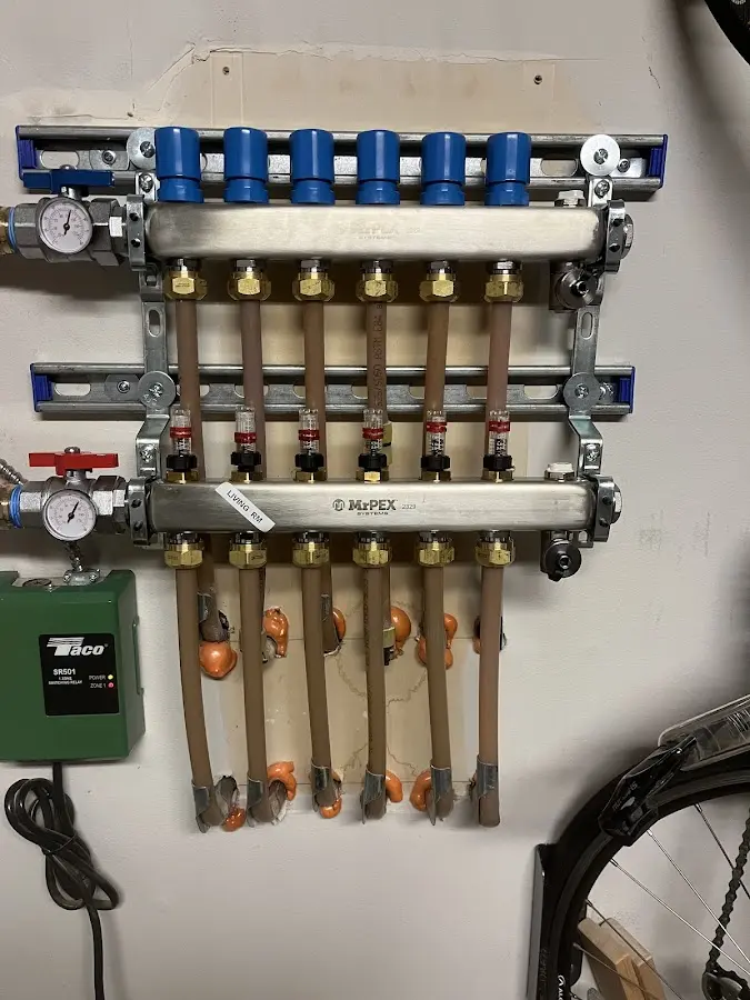 Plumber performing Sink Repair at a residential property in Iron Mountain